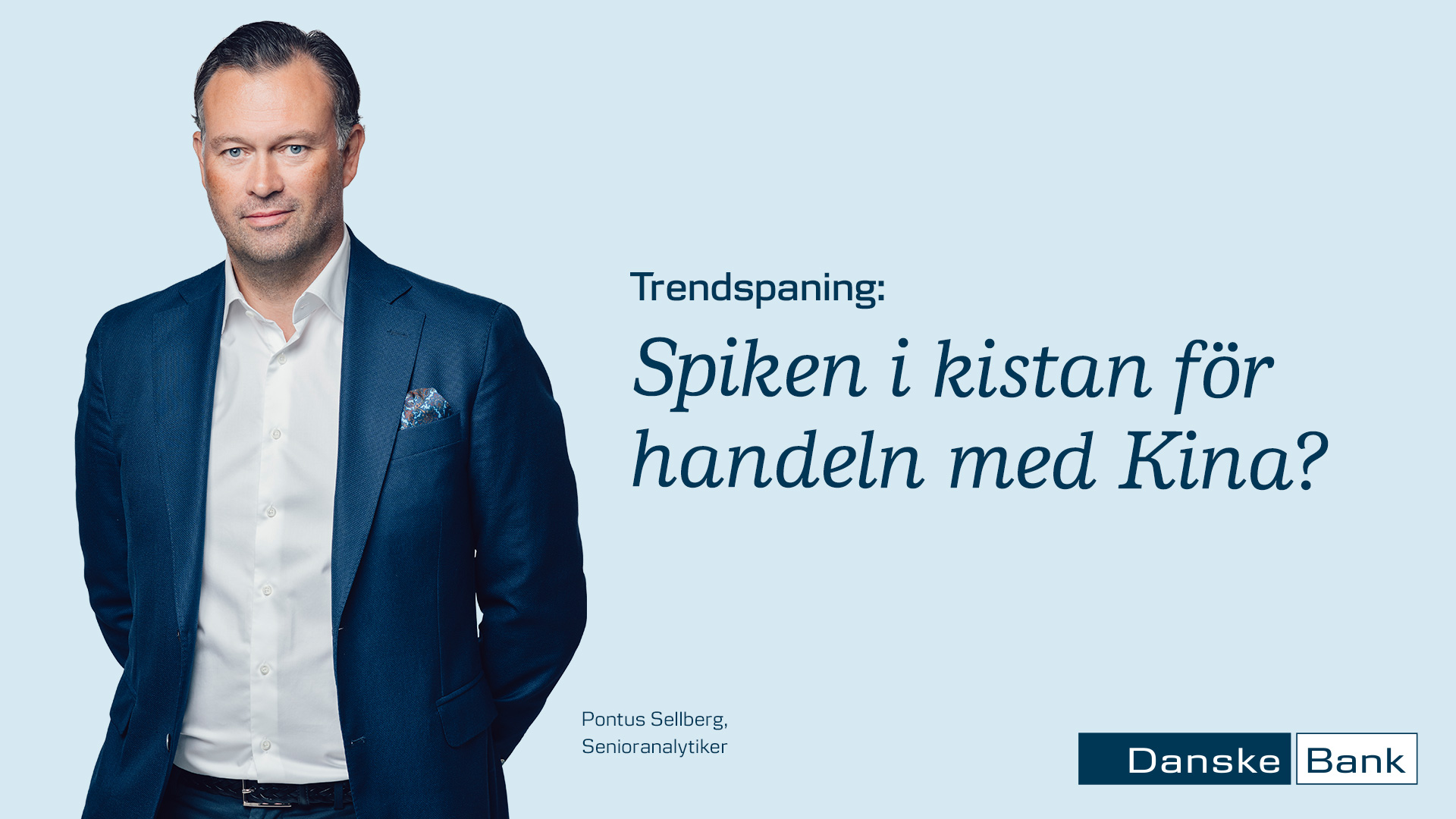 man i kostym plus texten spiken i kistan för handeln med kina?