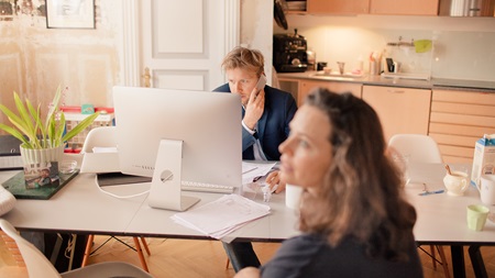 man and woman in the kitchen